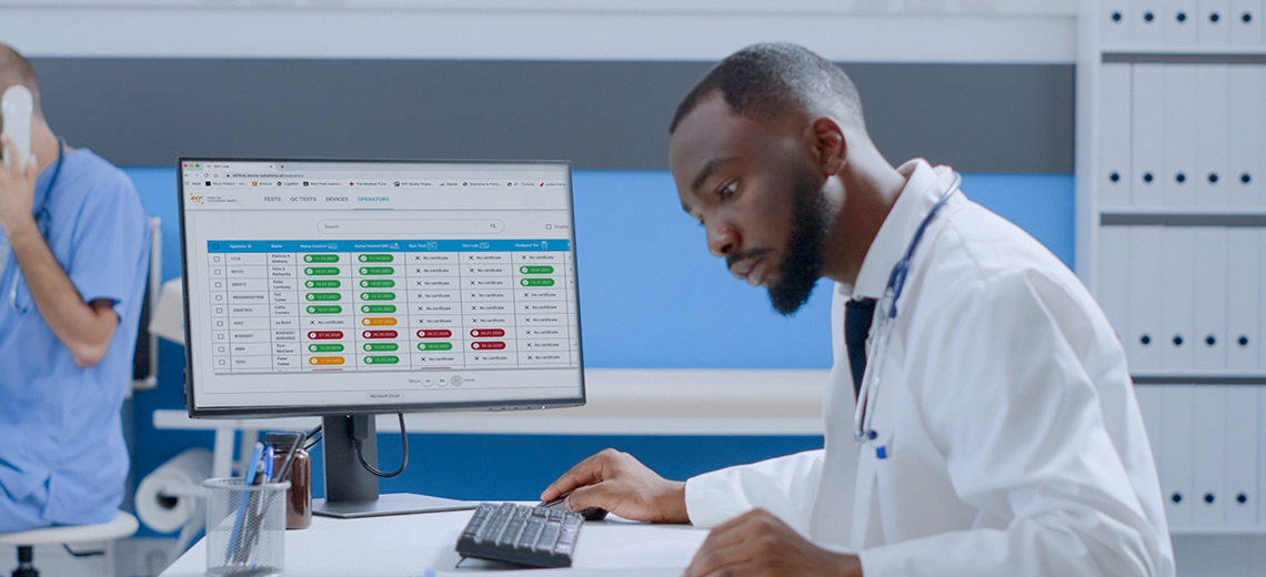 healthcare professional using EKF's data management solution, EKF Link